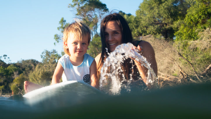 Me and my son Sam playing with my board in Noosa