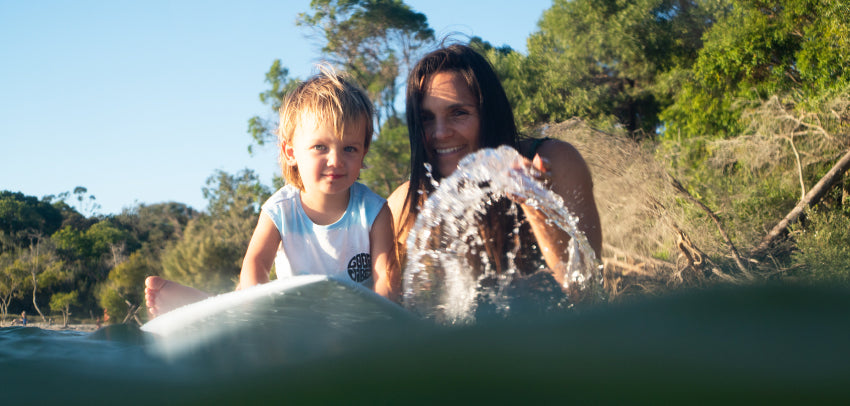 Me and my son Sam playing with my board in Noosa