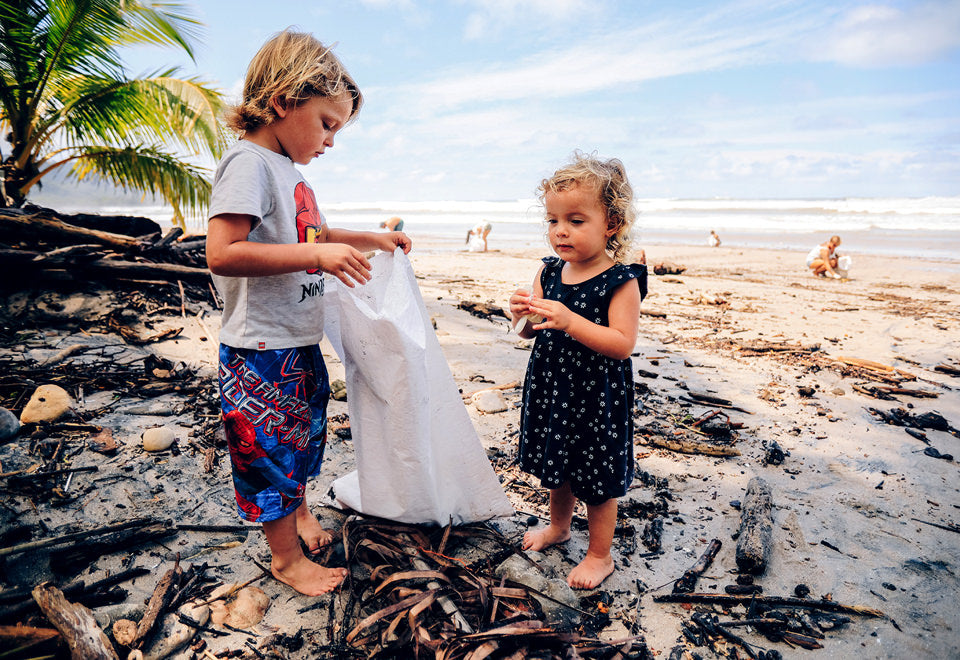 Kids cleaning the beach in Santa Teresa Costa Rica