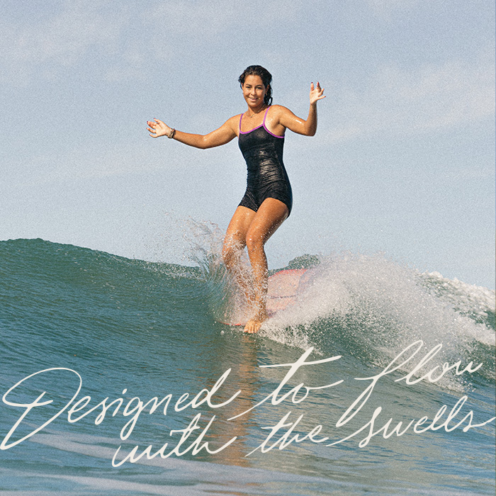 Lia Diaz longboarding in Costa Rica wearing her Dkoko one piece surf bikini